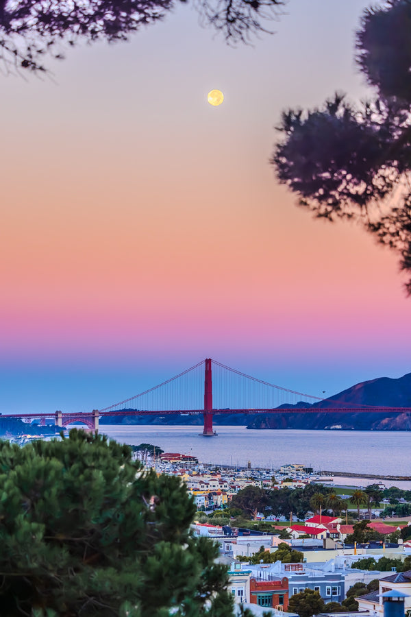 Full Moon hovers over the Golden Gate Bridge