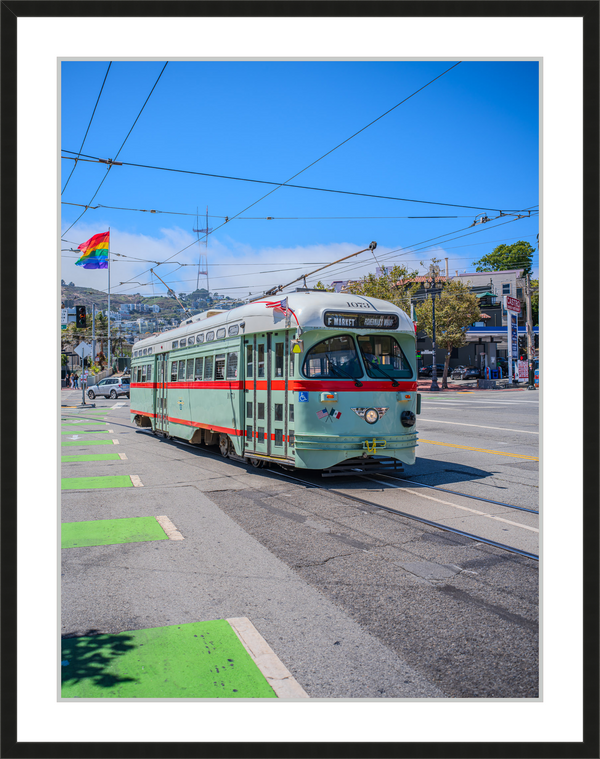 Historic F Train with the Pride Flag in the background Framed Wall Art