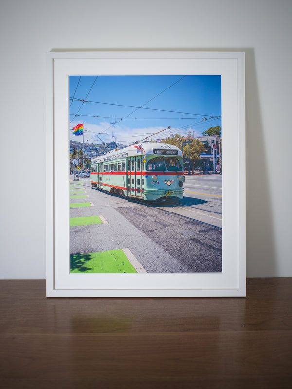 Historic F Train with the Pride Flag in the background Framed Wall Art